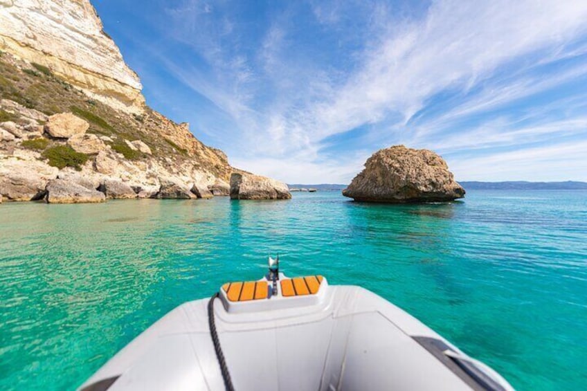 Tour of Cagliari by boat, snorkeling and aperitif on board!