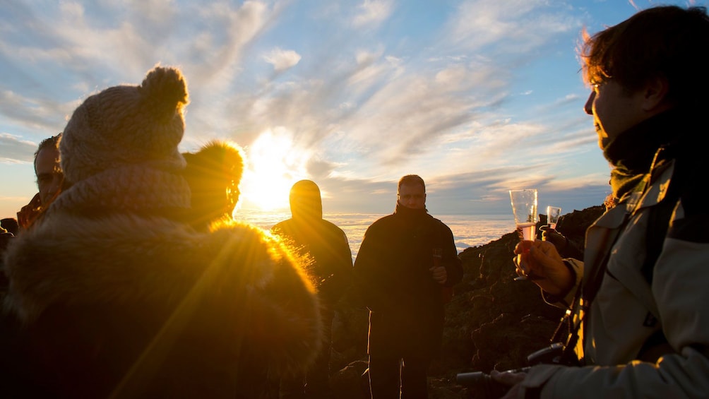 Indlæs billede 5 af 4. People enjoying drinks on Teide volcano in Spain
