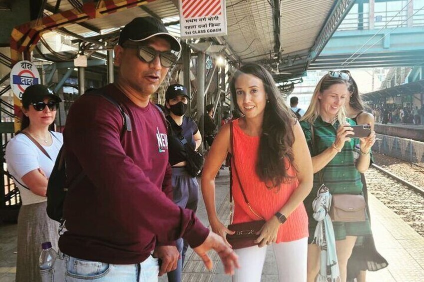 Tourists from UAE experiencing local transportation in Full Mumbai Tour