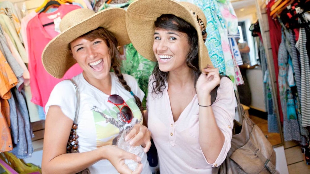 Ladies wearing sun hats on the Castries Shopping Highlight tour 