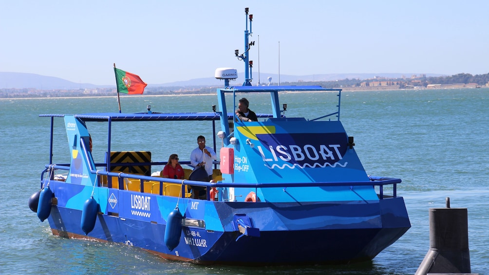 Boat turning to dock in Lisbon