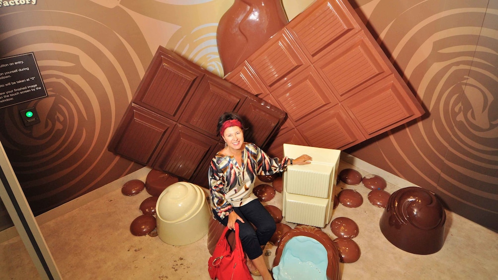 Show item 1 of 4. Woman smiling at the Amazing World of Chocolate in Australia