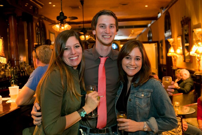 Show item 5 of 9. Trio at bar in New Orleans