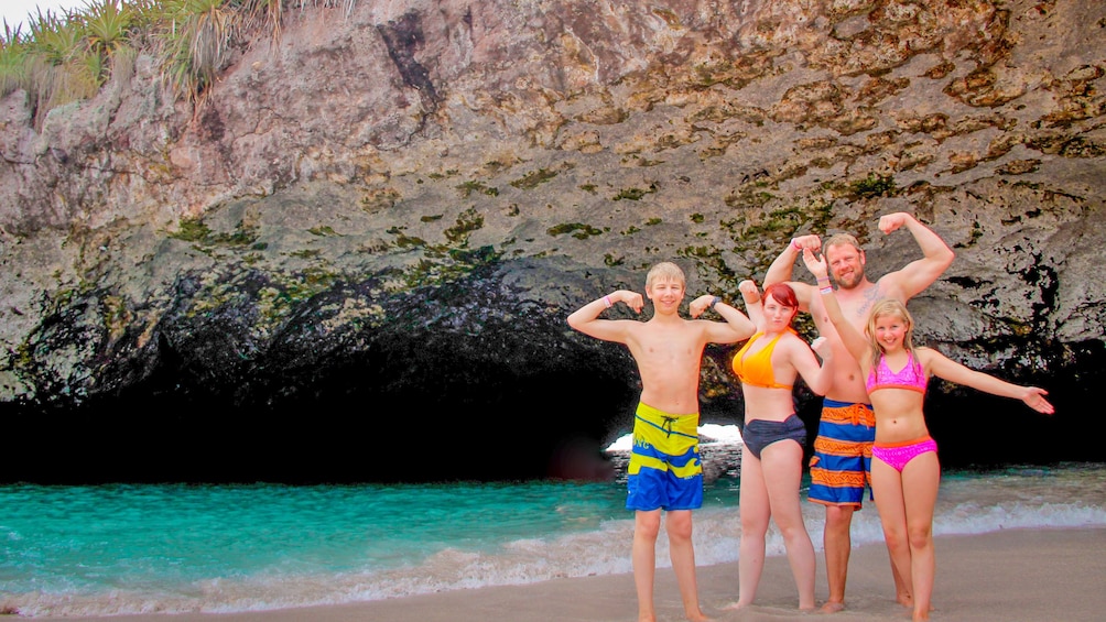 Family on a secret beach in Nayarit, Mexico