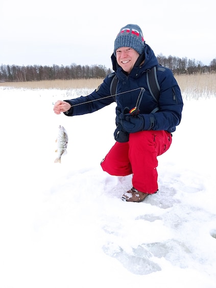 Picture 6 for Activity From Helsinki, Ice fishing experience with meal and drink.