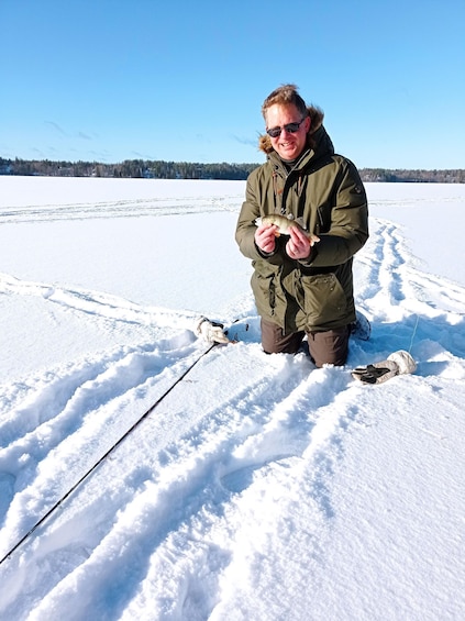 Picture 7 for Activity From Helsinki, Ice fishing experience with meal and drink.