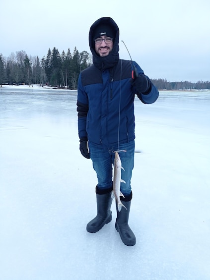 Picture 9 for Activity From Helsinki, Ice fishing experience with meal and drink.