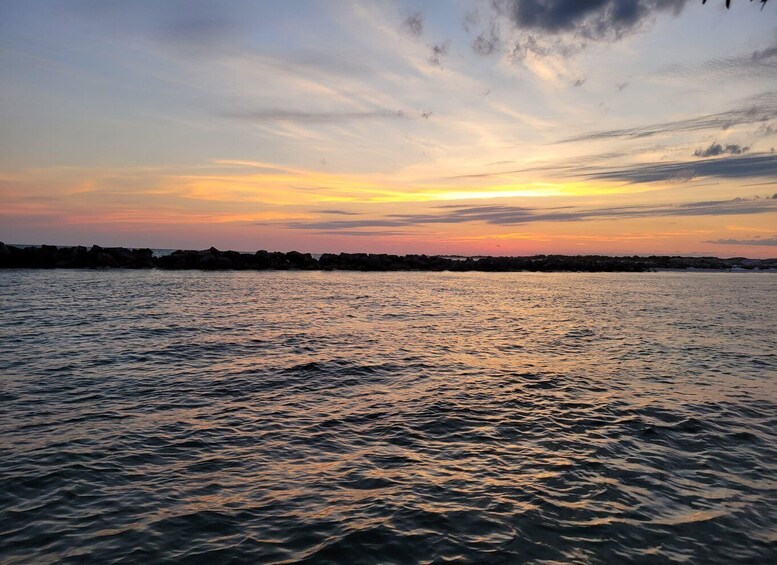 Picture 10 for Activity Destin: Sunset Cruise with Soft Drinks on a Tiki-Themed Boat