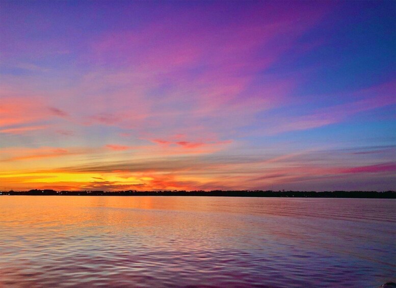 Picture 6 for Activity Destin: Sunset Cruise with Soft Drinks on a Tiki-Themed Boat