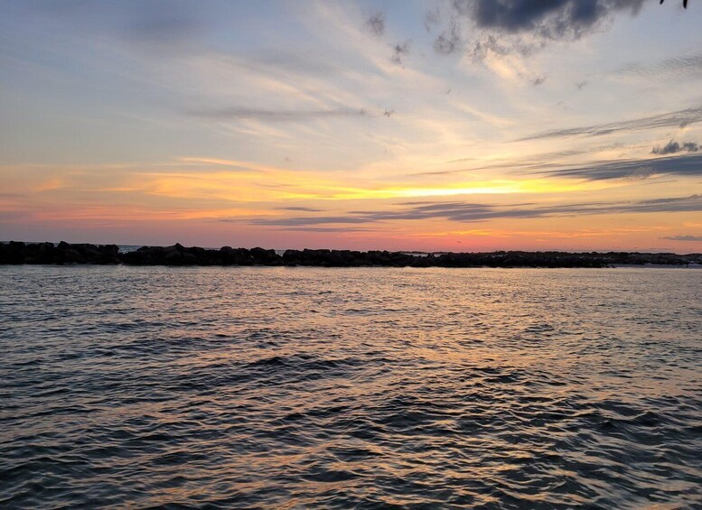 Picture 10 for Activity Destin: Sunset Cruise with Soft Drinks on a Tiki-Themed Boat