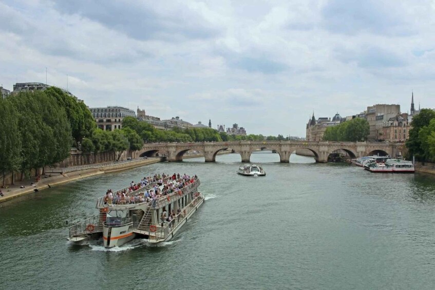 Picture 1 for Activity Paris: Catacombs Entry Ticket, Audio Guide, and River Cruise