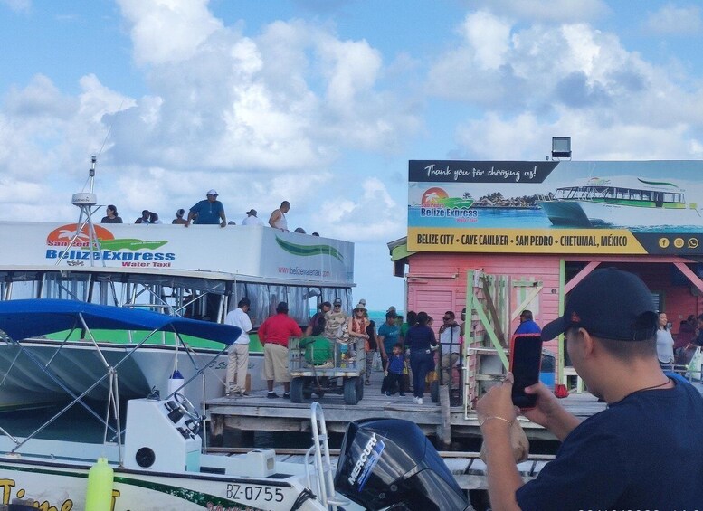 From Your Hotel in San Ignacio to Caye Caulker/Van + Ferry