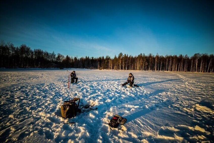 Snowshoe Trekking, Ice Fishing, and Grilling in Arctic Nature from Rovaniemi