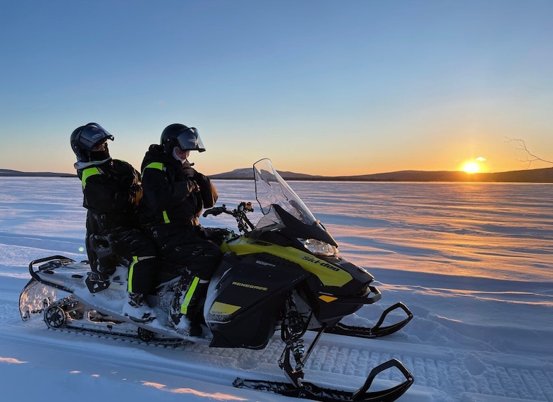 Kiruna: Guided Snowmobile Tour and Swedish Fika Experience