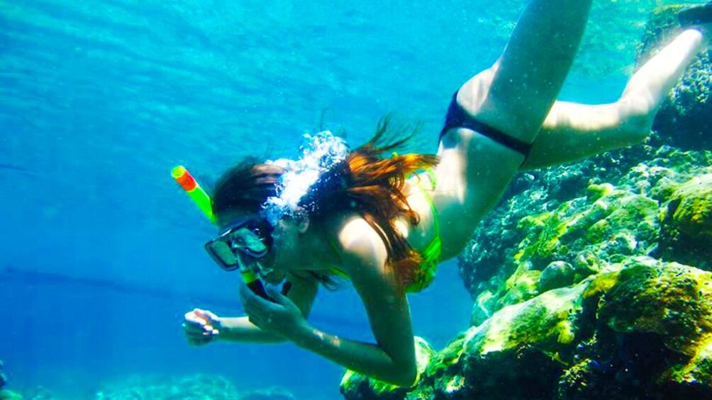 A woman snorkeling
