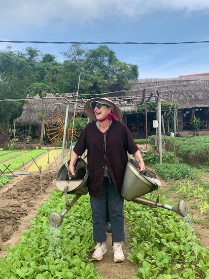 Farming with Farmers at ancient vegetable Village "Tra Que"