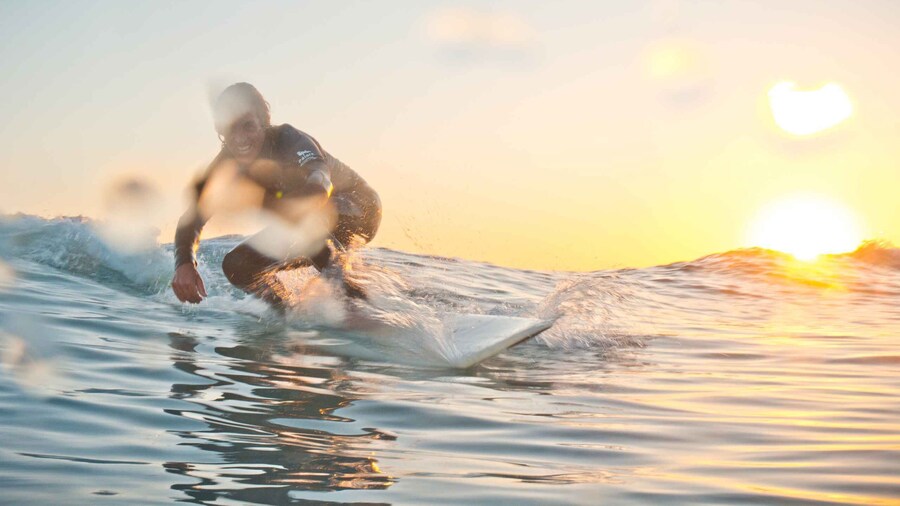 Learn to surf at the white beaches in Fuerteventura's south