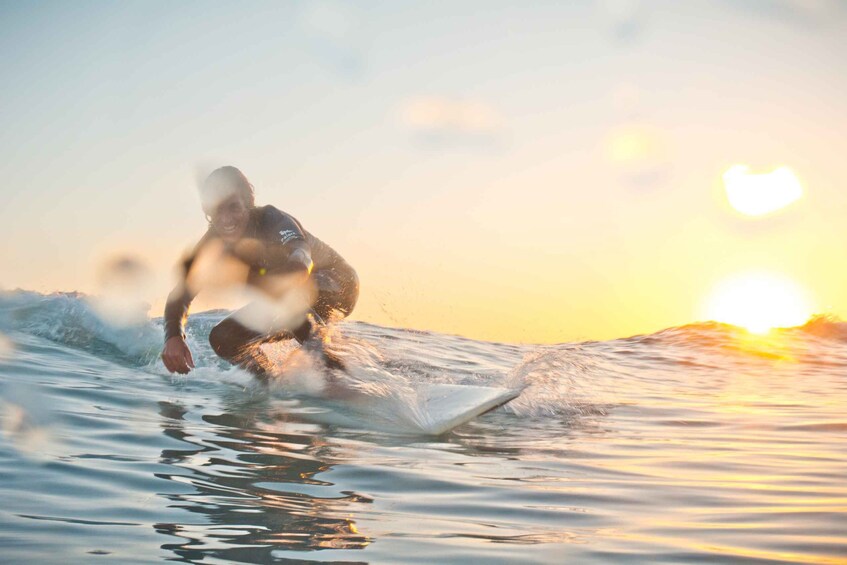 Learn to surf at the white beaches in Fuerteventura's south