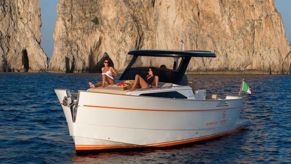 Picture 1 for Activity Sorrento: Private Tour to Capri on a 2024 Gozzo Boat