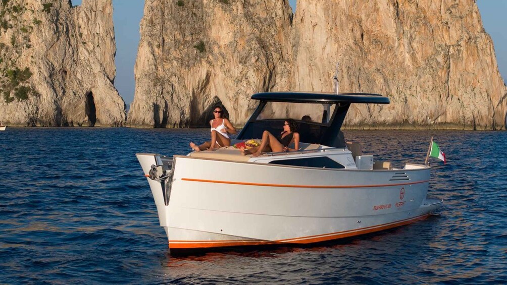 Picture 1 for Activity Sorrento: Private Tour to Capri on a 2024 Gozzo Boat