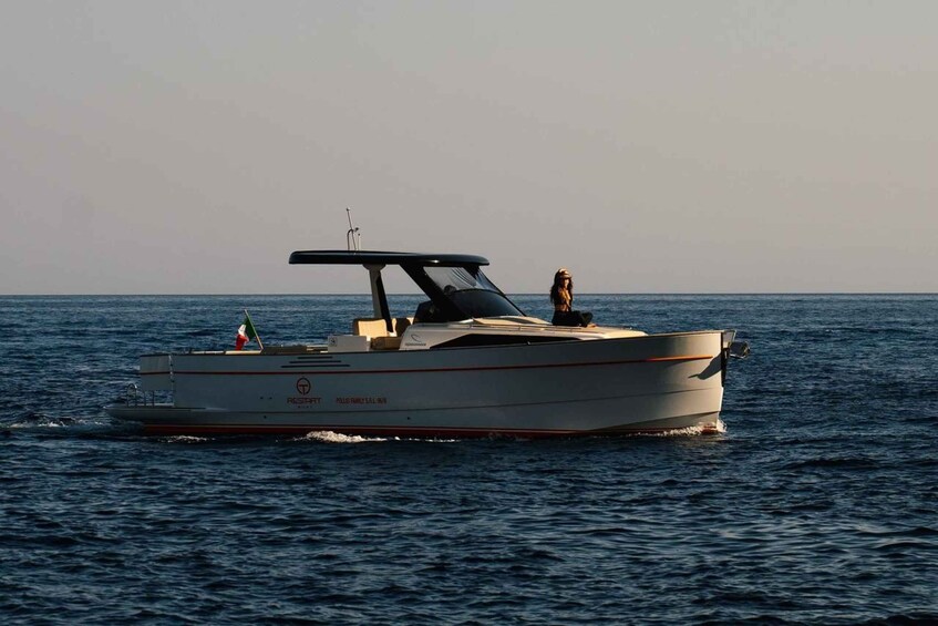 Picture 3 for Activity Sorrento: Private Tour to Capri on a 2024 Gozzo Boat