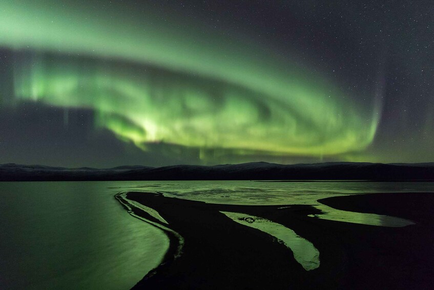 Picture 1 for Activity Abisko: Guided Autumn Aurora Chase with Hotel Transfers