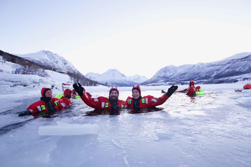 Picture 9 for Activity Tromsø: Arctic Ocean Floating Camp Rescue Suit Swimming