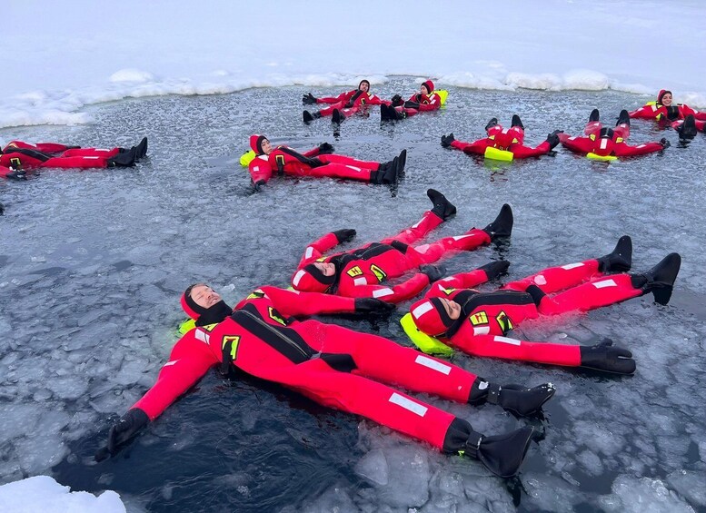 Picture 3 for Activity Tromsø: Arctic Ocean Floating Camp Rescue Suit Swimming