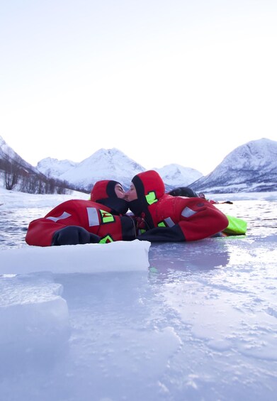 Picture 8 for Activity Tromsø: Arctic Ocean Floating Camp Rescue Suit Swimming