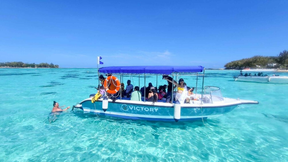 Picture 1 for Activity Blue Bay: Blue Bay Glass Bottom Boat Visit and Snorkeling