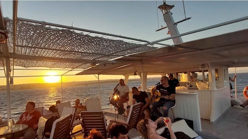 Rhodes: Sunset Cruise with Live Music, Wine & Greek Buffet