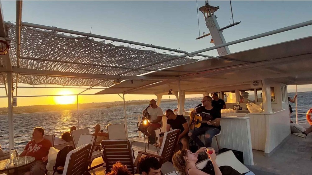 Rhodes: Sunset Cruise with Live Music, Wine & Greek Buffet