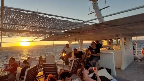 Rhodes: Sunset Cruise with Live Music, Wine & Greek Buffet