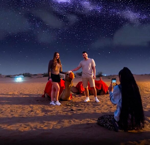 Doha: Nighttime Desert Safari with Dune Bashing & Camel Ride