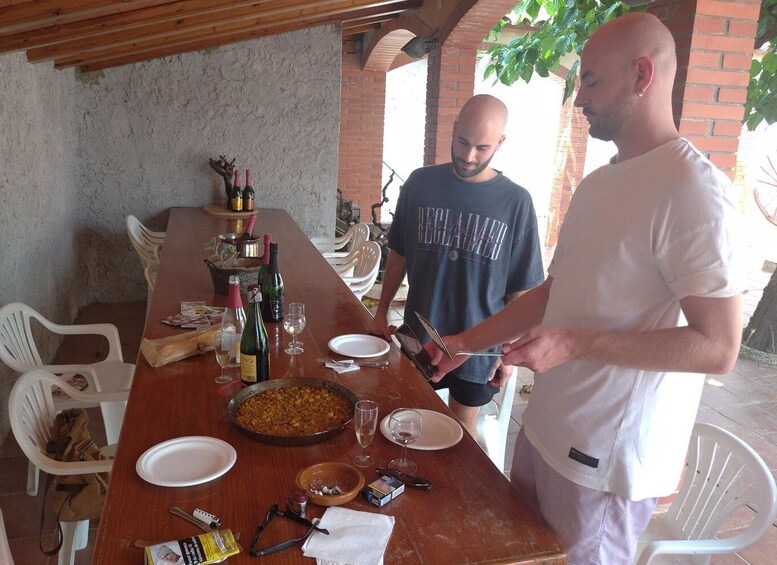 Picture 3 for Activity From Sitges: Paella Masterclass with Drink and Bike Ride