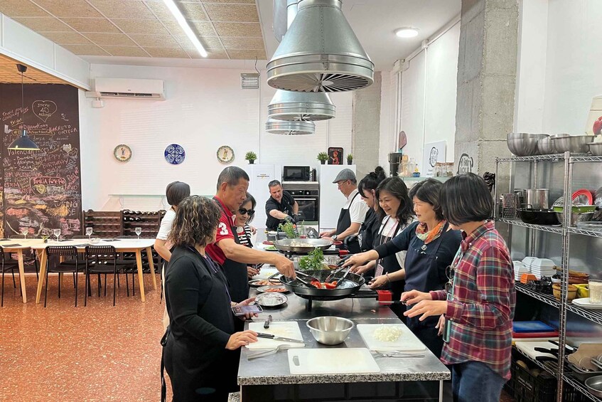 Picture 1 for Activity Valencia: Evening Guided Paella Workshop, Tapas, and Drinks