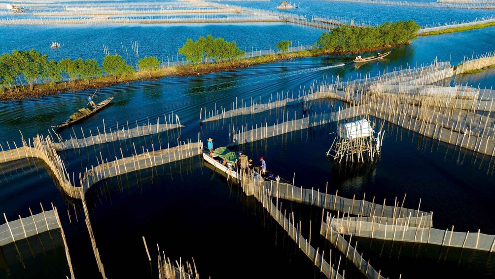 Sunrise floating market on Tam Giang lagoon