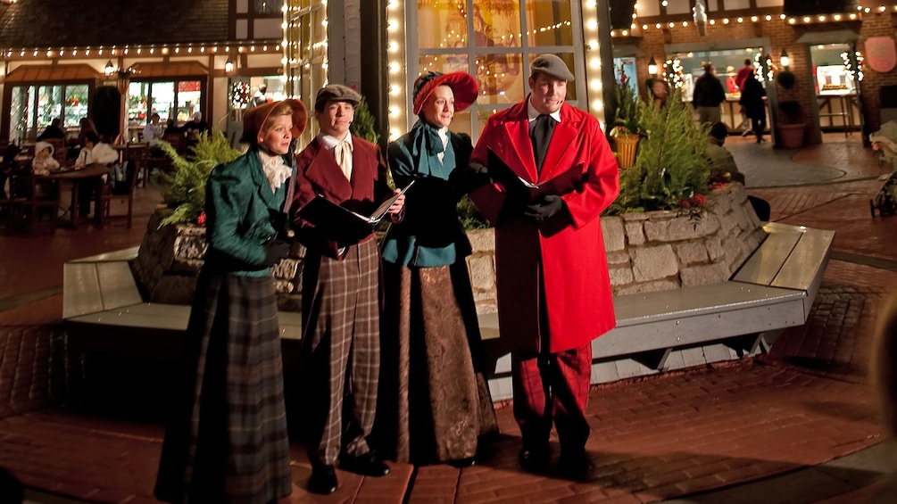 Singing group near clock tower in williamsburg