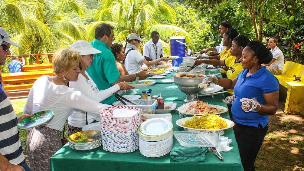 Outdoor buffet line in Jamaica 
