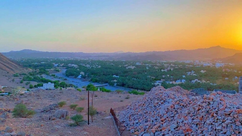 Nizwa Sunset Serenity: Omani Coffee and Dates at a Hilltop