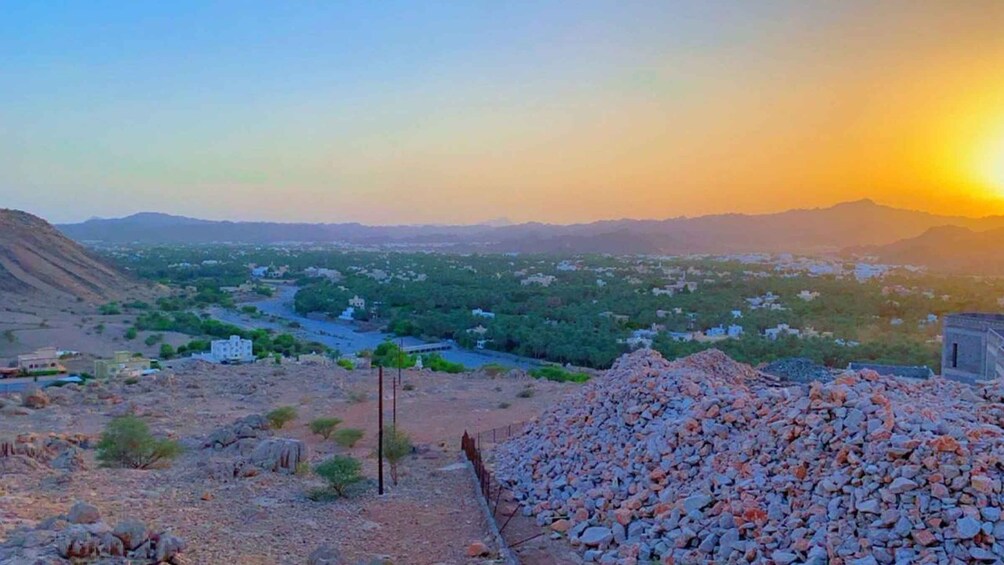 Nizwa Sunset Serenity: Omani Coffee and Dates at a Hilltop