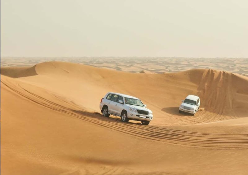 Picture 1 for Activity Doha Sunset Safari: Dune Bashing, Sandboarding & Camel Ride