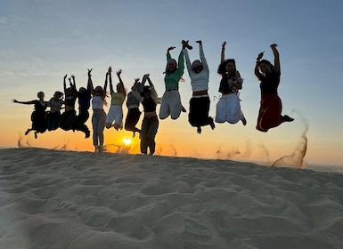 Doha Sunset Safari, dune bashing, Sandboarding & Naik Unta