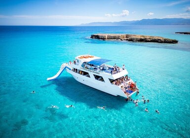 Paphos/Akamas: Blue Lagoon Bus & Boat Tour with Water Slide