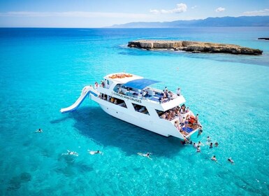 Paphos/Akamas: Blue Lagoon Bus & Boat Tour with Water Slide