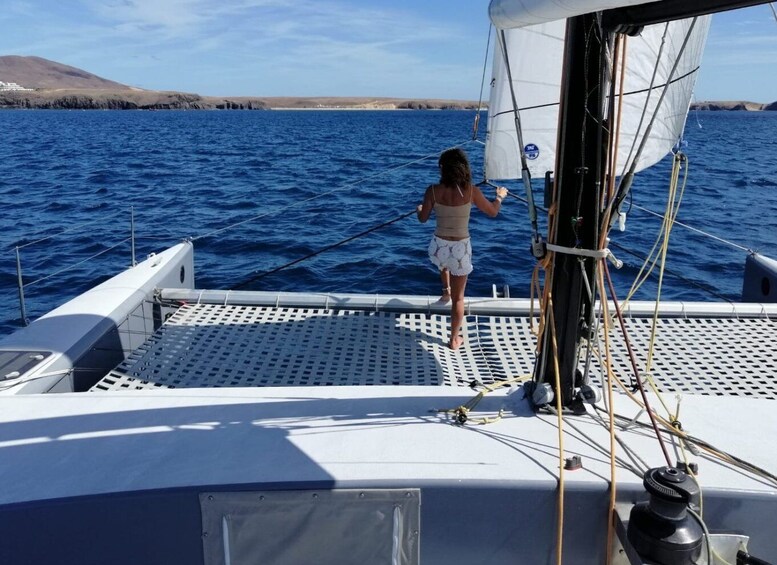 Playa Blanca: Private Catamaran Tour with SUP and Snorkeling