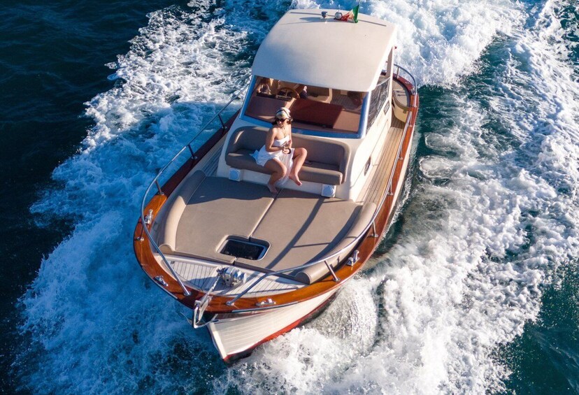 Capri: Private Boat Trip with Snorkeling and Island Stop