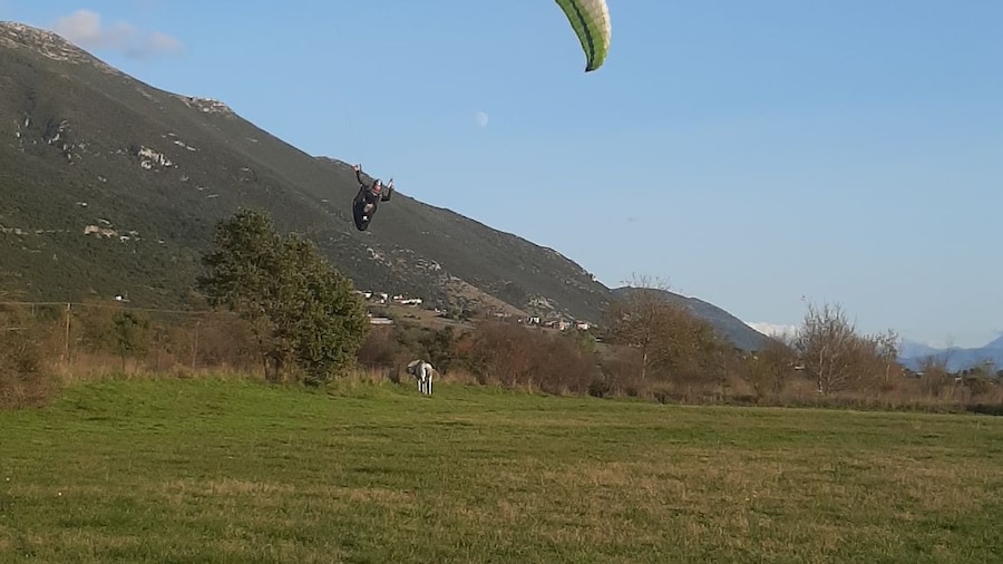 Tandem paragliding above ionian sea syvota