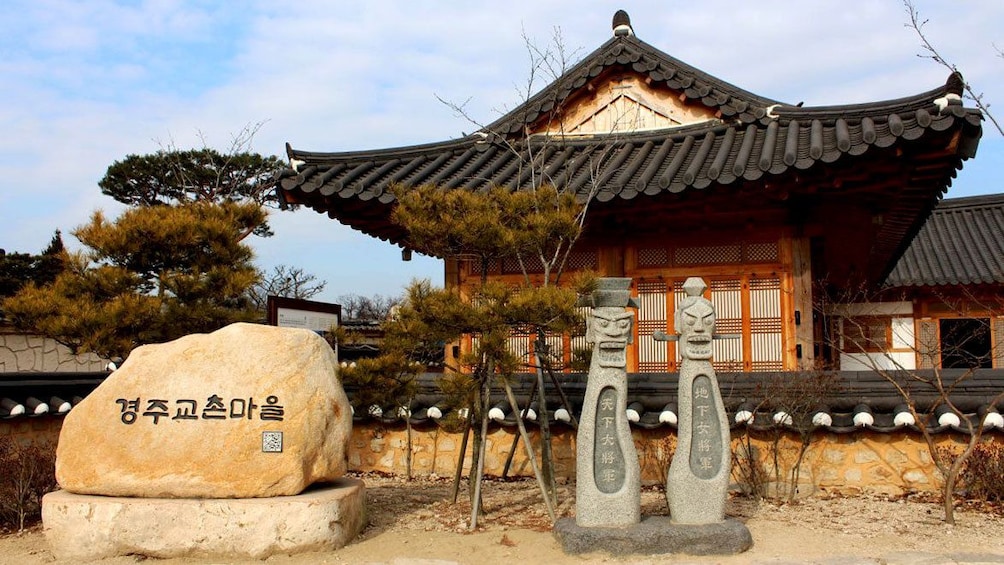 Statues outside of historical building in Gyeongju