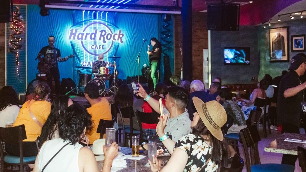 Picture 3 for Activity Cancún: Night-time Party Bus Tour & Music at Hard Rock Cafe